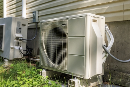 Heat pump air-condition units installed in the backyard.